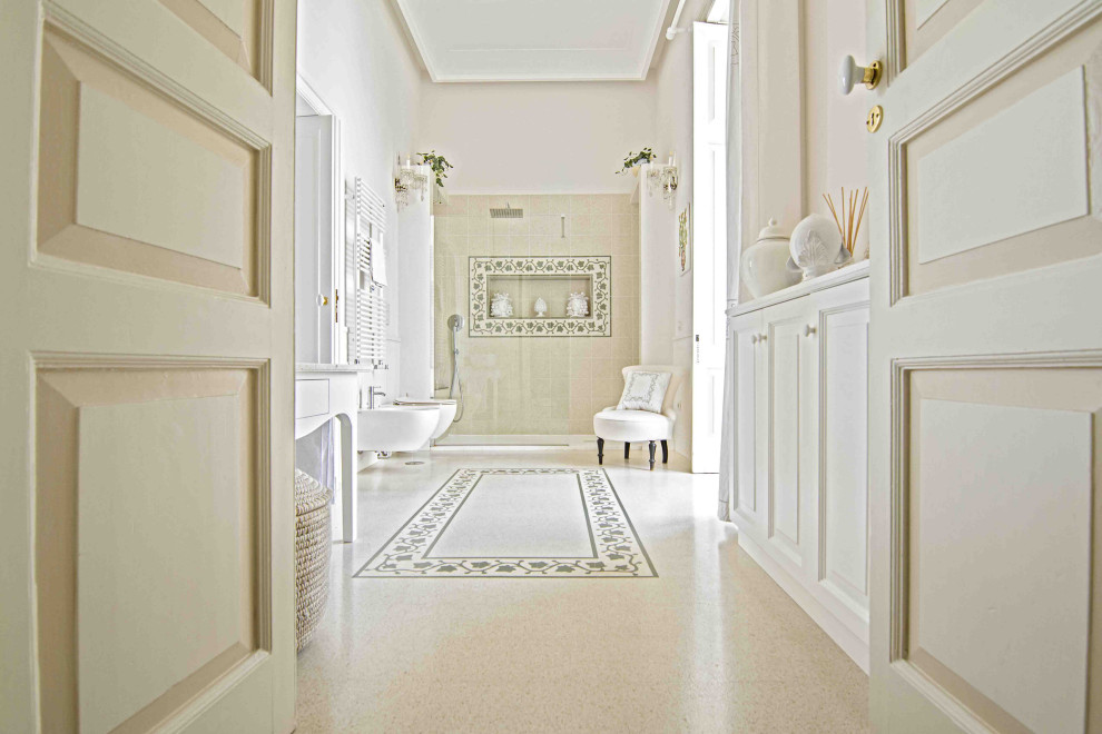Design ideas for a large traditional master bathroom in Naples with raised-panel cabinets, white cabinets, a claw-foot tub, a two-piece toilet, beige tile, ceramic tile, beige walls, marble benchtops, white benchtops, a single vanity, a freestanding vanity, a curbless shower, cement tiles, a vessel sink, beige floor, a niche, recessed and decorative wall panelling.