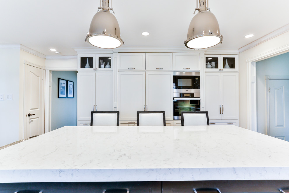 Example of a transitional kitchen design in Toronto