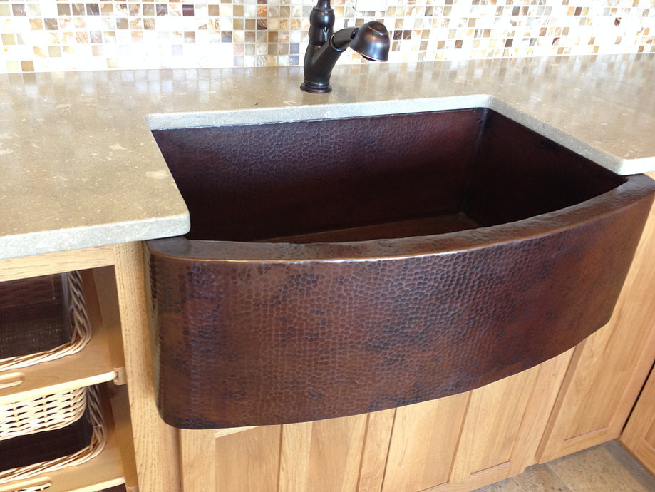 Inspiration for a transitional kitchen remodel in Phoenix with a farmhouse sink, shaker cabinets, light wood cabinets, quartz countertops, multicolored backsplash and mosaic tile backsplash