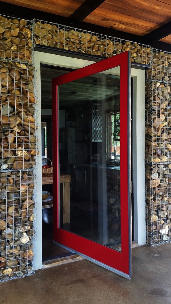 Inspiration for a rustic entryway remodel in Dallas