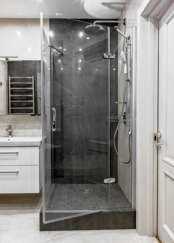 This is an example of a contemporary 3/4 bathroom in Moscow with flat-panel cabinets, white cabinets, beige floor and a hinged shower door.