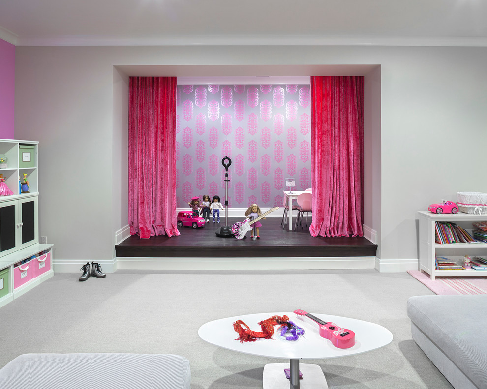 Expansive transitional kids' playroom in New York with carpet and multi-coloured walls for kids 4-10 years old and girls.