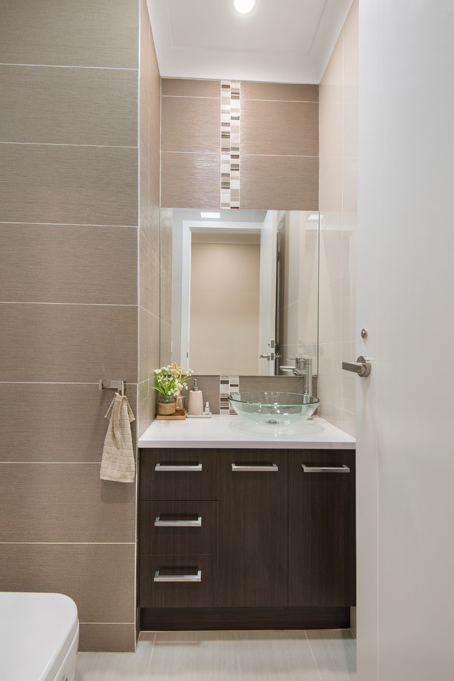 Design ideas for a small contemporary powder room in Brisbane with brown tile, porcelain tile, brown walls, porcelain floors and engineered quartz benchtops.