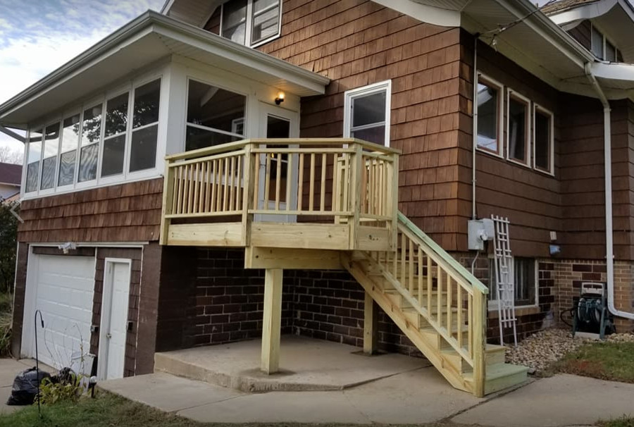 Deck - small rustic backyard deck idea in Chicago with no cover