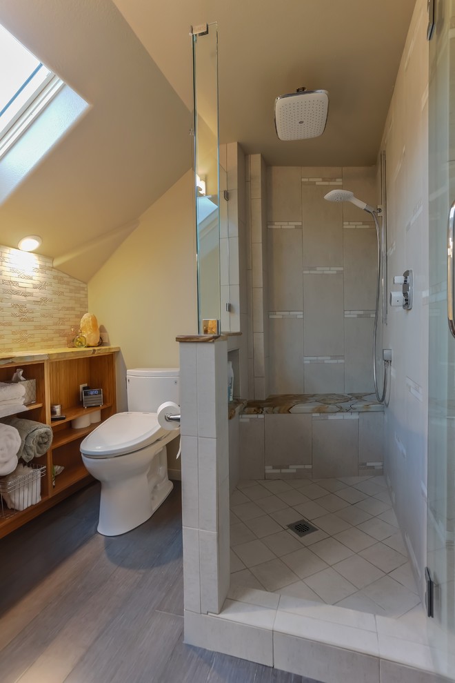 Small midcentury master bathroom in Other with an undermount sink, flat-panel cabinets, medium wood cabinets, quartzite benchtops, a double shower, a bidet, gray tile, mosaic tile, beige walls and bamboo floors.