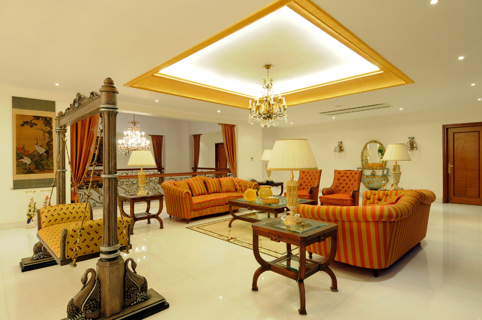 Traditional open concept living room in Hyderabad with white walls and white floor.