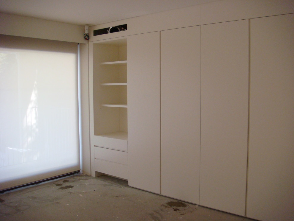 Design ideas for a contemporary storage and wardrobe in Sydney.