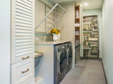 Transitional Laundry Room by Selle Valley Construction, Inc.