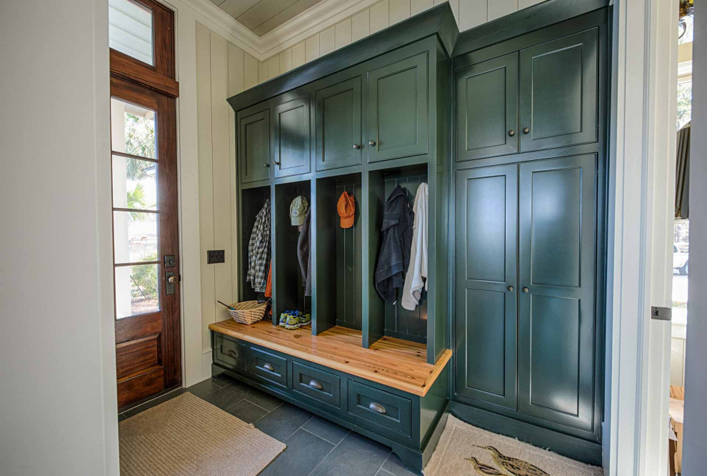 Design ideas for a mudroom in Other with beige walls, slate floors, a single front door, a dark wood front door, grey floor, timber and planked wall panelling.