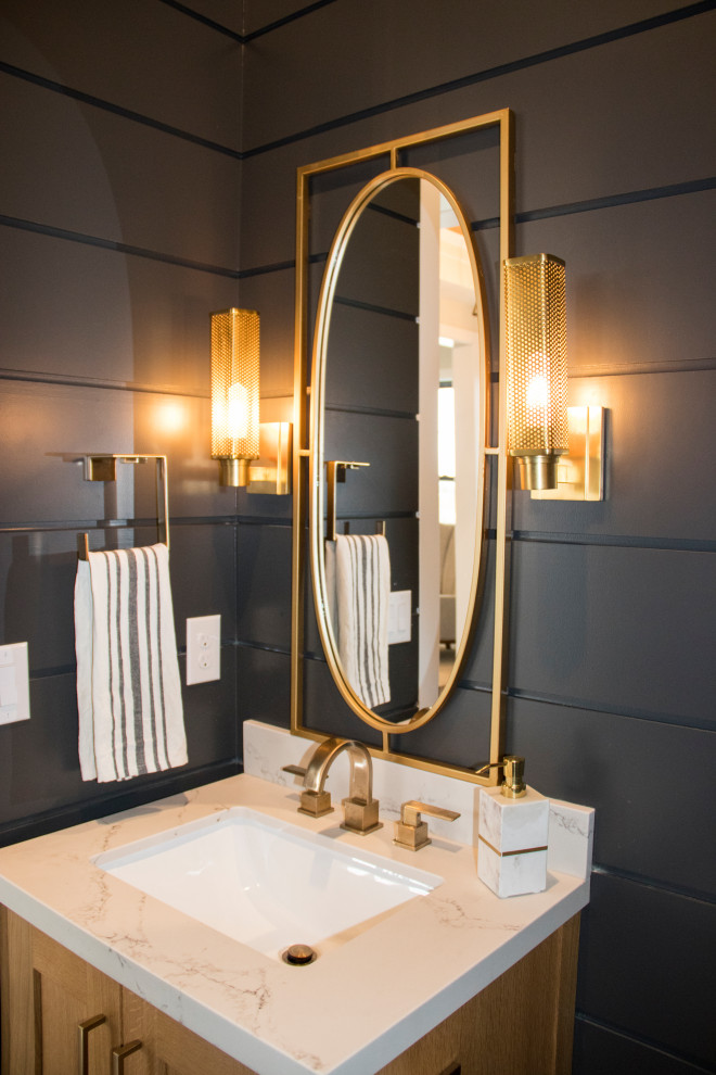 Design ideas for a small transitional powder room in Salt Lake City with shaker cabinets, medium wood cabinets, black walls, an undermount sink, beige benchtops, a built-in vanity and planked wall panelling.