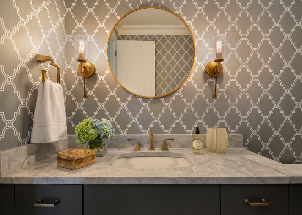Design ideas for a mid-sized contemporary powder room in Seattle with flat-panel cabinets, grey cabinets, grey walls, an undermount sink and marble benchtops.
