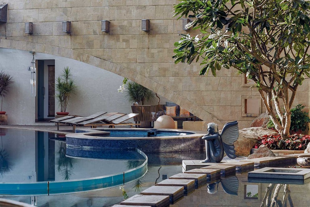 This is an example of an eclectic swimming pool in Pune.