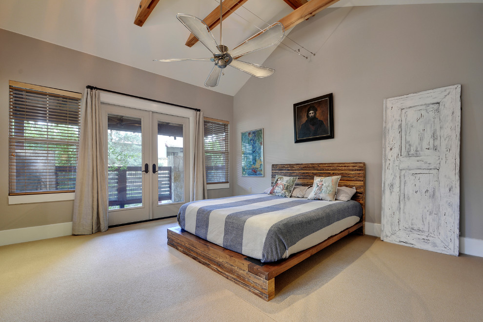 Transitional master bedroom in Austin with grey walls, carpet and beige floor.