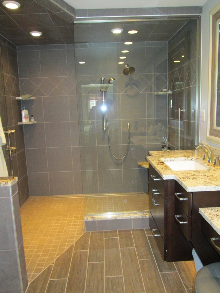 Mid-sized transitional bathroom photo with an undermount sink and granite countertops