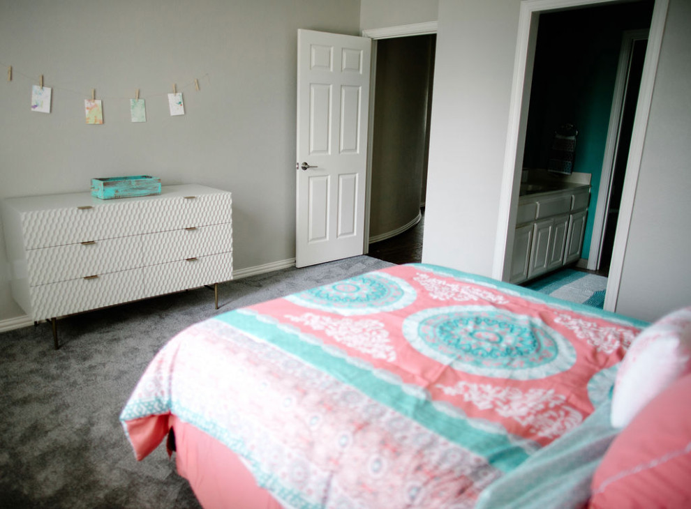 This is an example of a mid-sized transitional guest bedroom in Dallas with grey walls, carpet and grey floor.