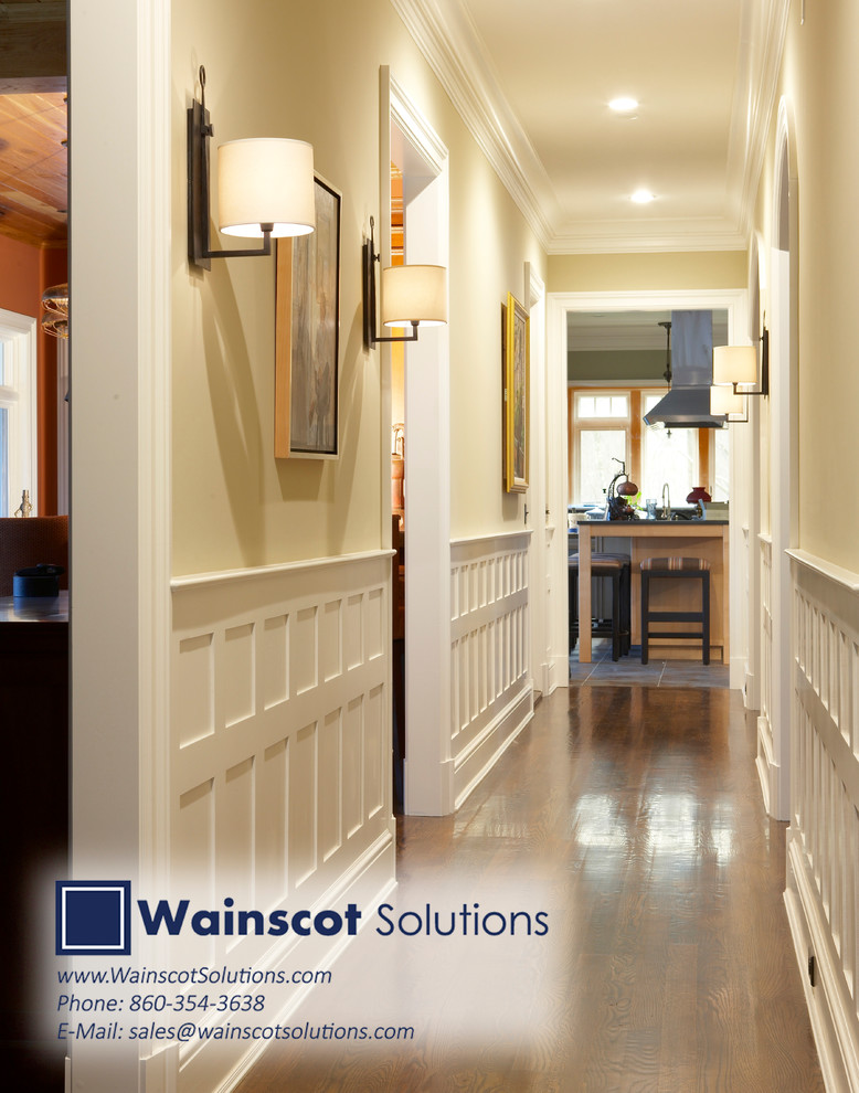 Inspiration for a large contemporary hallway in New York with beige walls and dark hardwood floors.