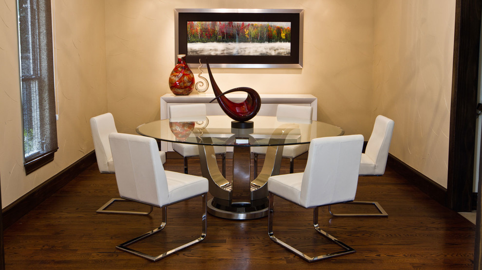 Inspiration for a large modern separate dining room in Dallas with beige walls, dark hardwood floors and no fireplace.