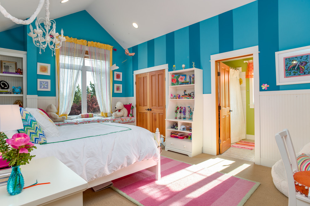 Large transitional kids' bedroom in Seattle with blue walls and carpet for kids 4-10 years old and girls.