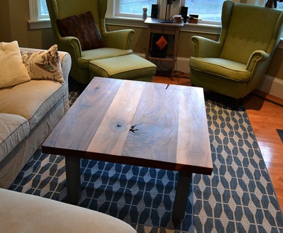 Inspiration for a mid-sized rustic open concept medium tone wood floor home design remodel in Orange County