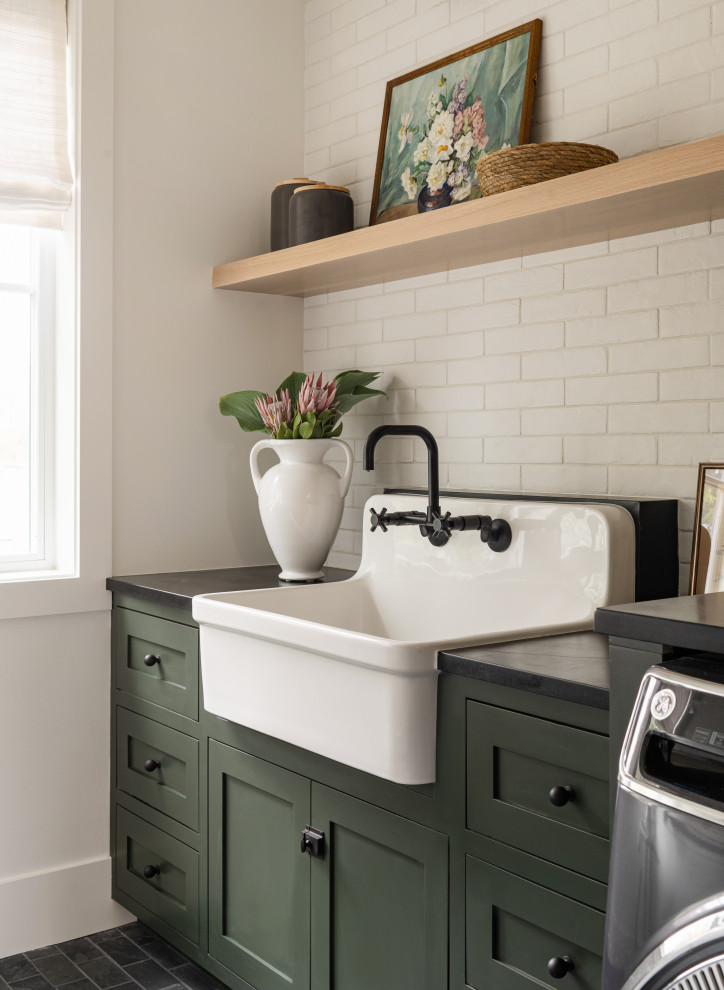 Design ideas for a transitional laundry room in Seattle.