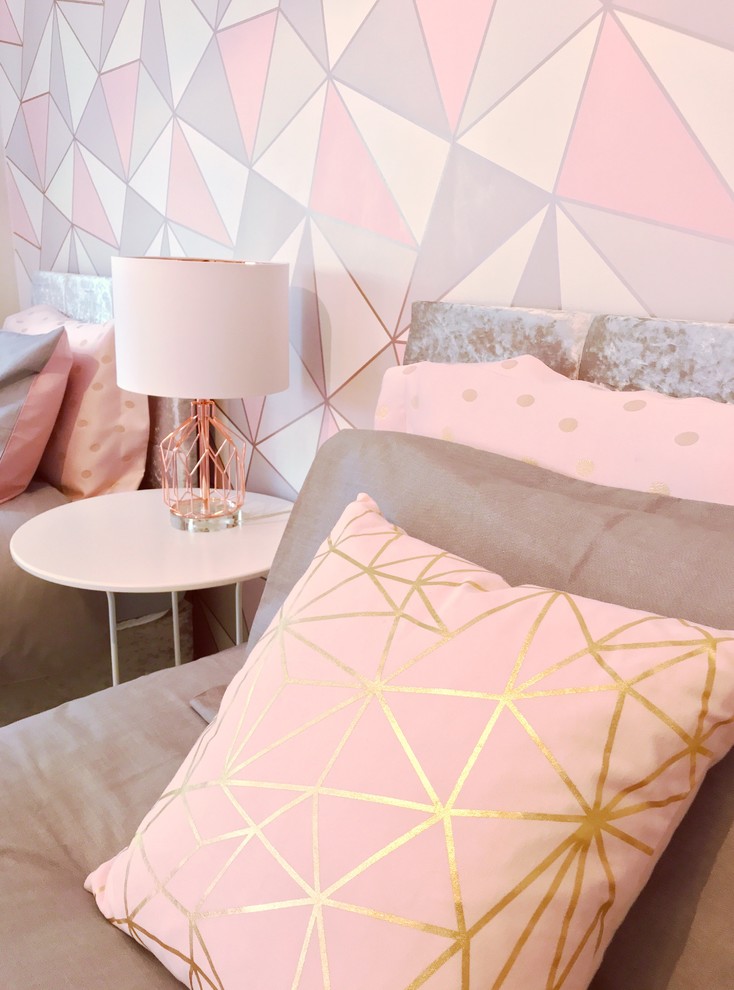 Mid-sized modern kids' room in London with grey walls, laminate floors and white floor for girls.