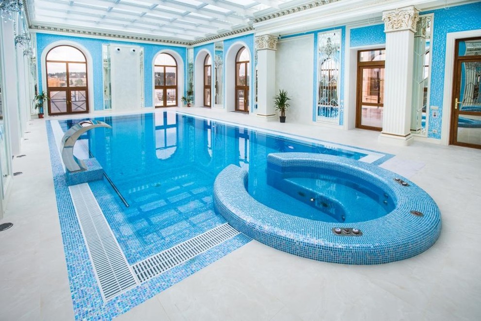 Inspiration for a mid-sized traditional indoor rectangular pool in Moscow with a hot tub.
