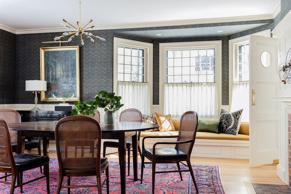 Inspiration for a transitional dining room in Boston with multi-coloured walls, light hardwood floors and beige floor.