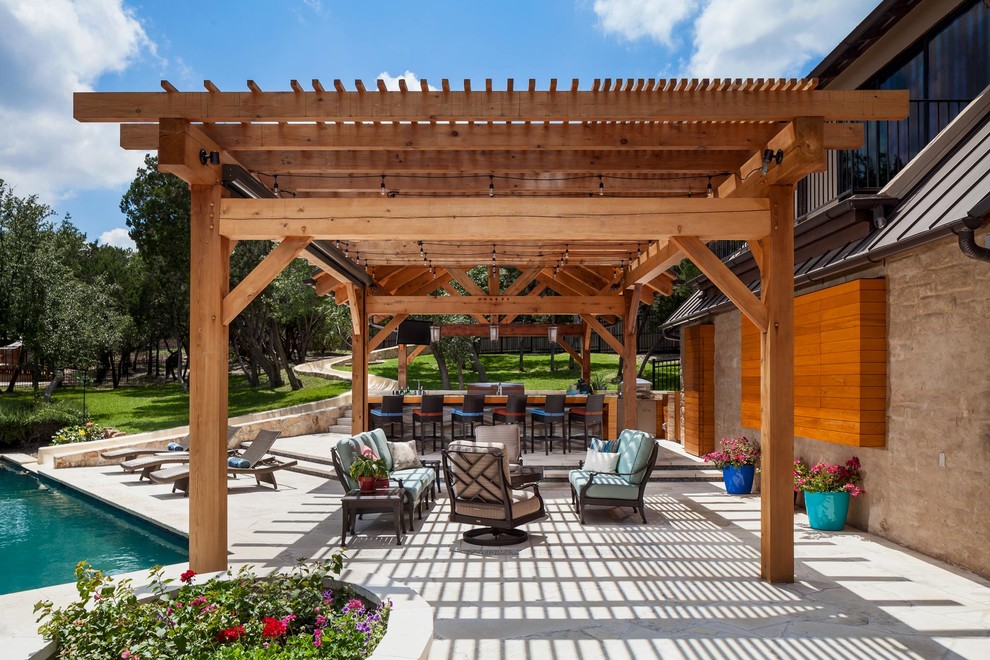 Design ideas for an expansive transitional backyard patio in Austin with a container garden and a gazebo/cabana.
