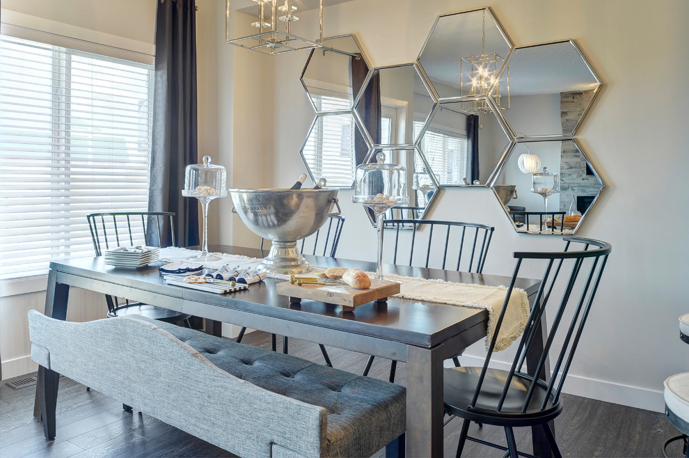 Example of a mid-sized transitional vinyl floor and black floor kitchen/dining room combo design in Edmonton with gray walls