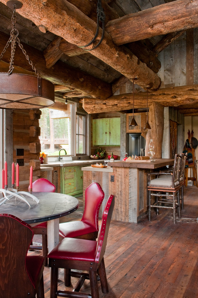 This is an example of a country kitchen in Other with distressed cabinets.