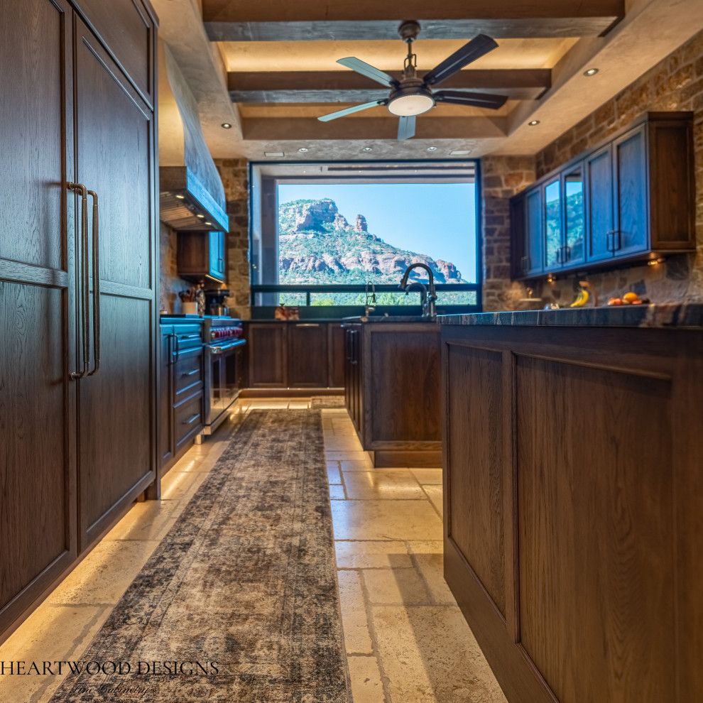Kitchen - transitional kitchen idea with shaker cabinets, dark wood cabinets, paneled appliances and an island