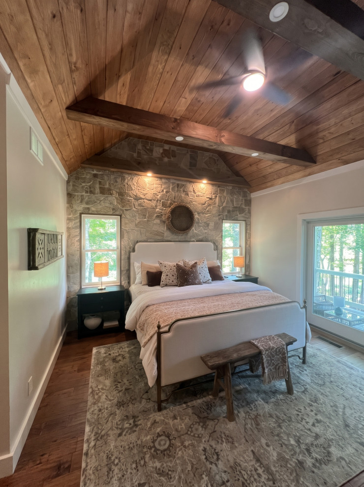 French Chalet Bedroom with Vaulted Wood Ceiling and Stonework