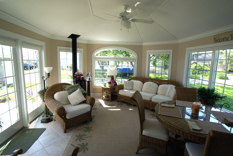 Photo of a mid-sized beach style sunroom in New York with ceramic floors, no fireplace and a standard ceiling.