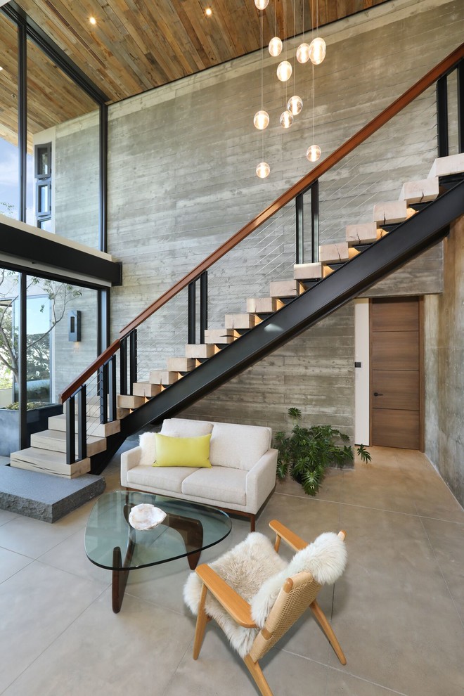 Contemporary wood l-shaped staircase in Orange County with cable railing.