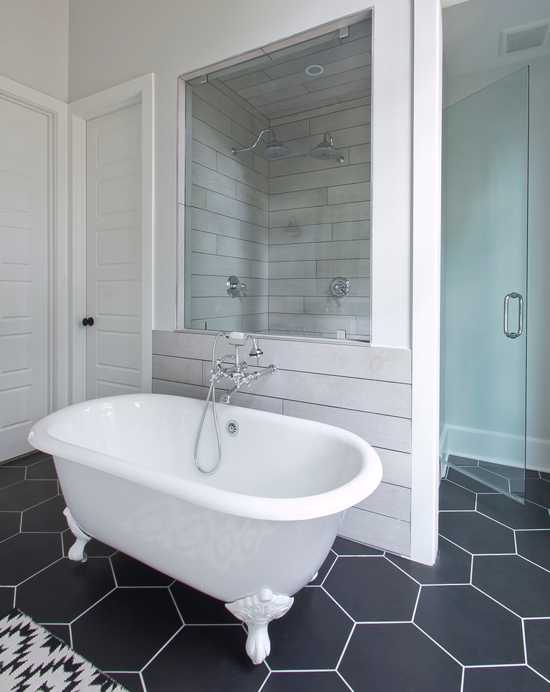 Photo of a mid-sized country master bathroom in Atlanta with shaker cabinets, white cabinets, a claw-foot tub, an open shower, a one-piece toilet, black tile, ceramic tile, ceramic floors, an undermount sink and granite benchtops.