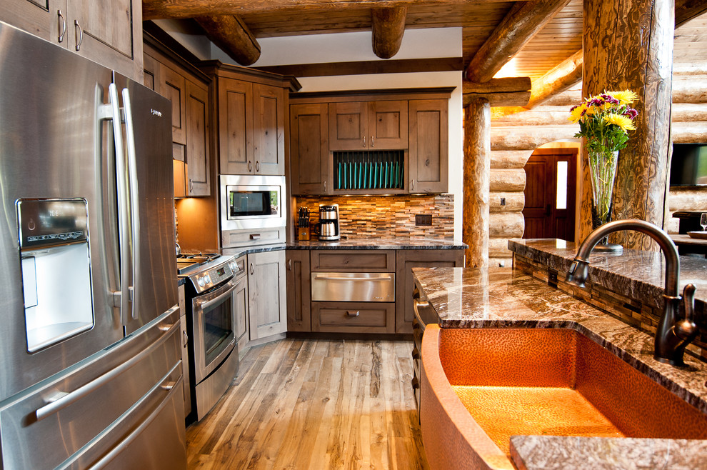 Eat-in kitchen - rustic l-shaped eat-in kitchen idea in Denver with an island