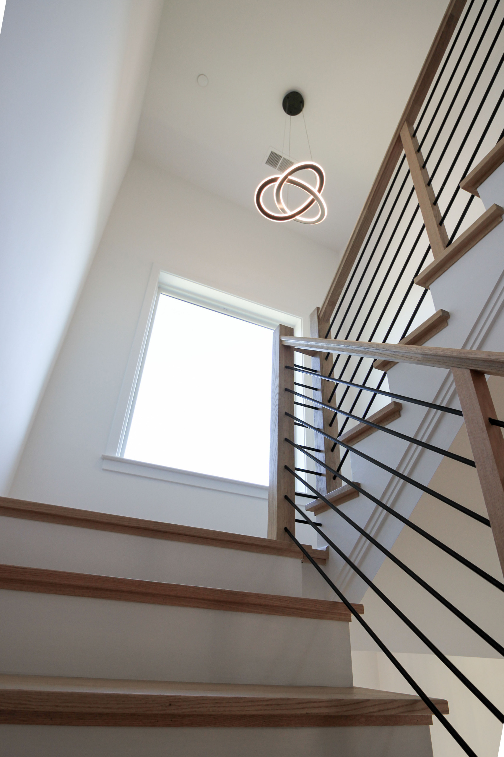 94_Neutral Color Floating Staircase with Metal Balusters, Bethesda MD 20817