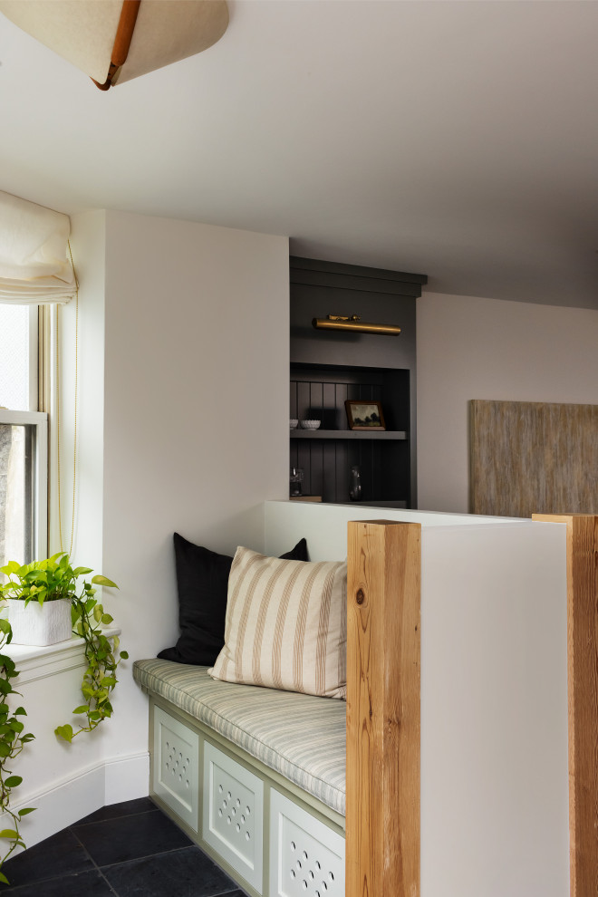 Example of a transitional home design design in Boston