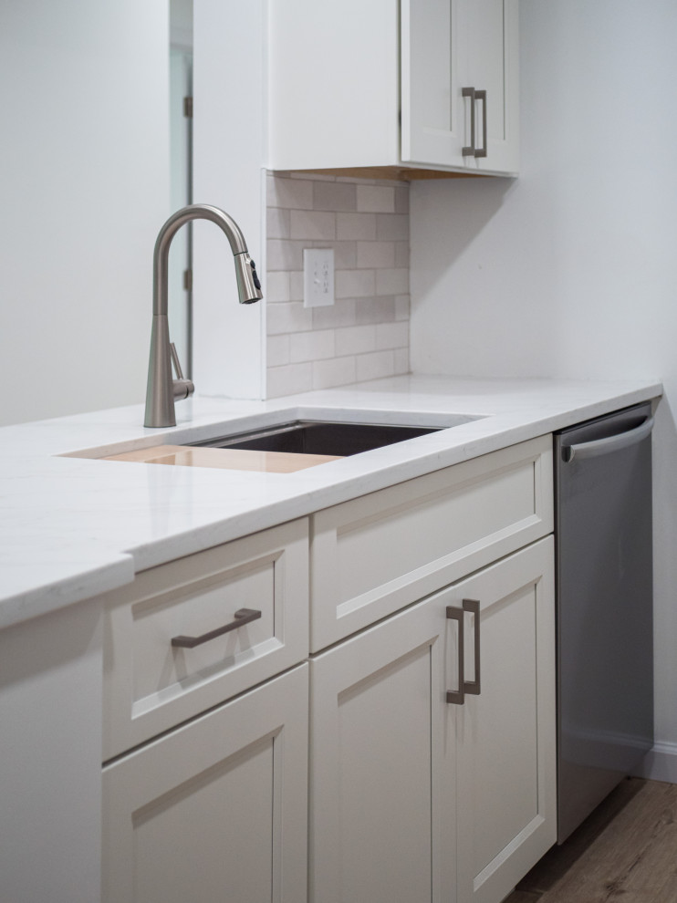 Example of a small transitional galley eat-in kitchen design in Columbus with shaker cabinets, white cabinets, quartz countertops and white countertops
