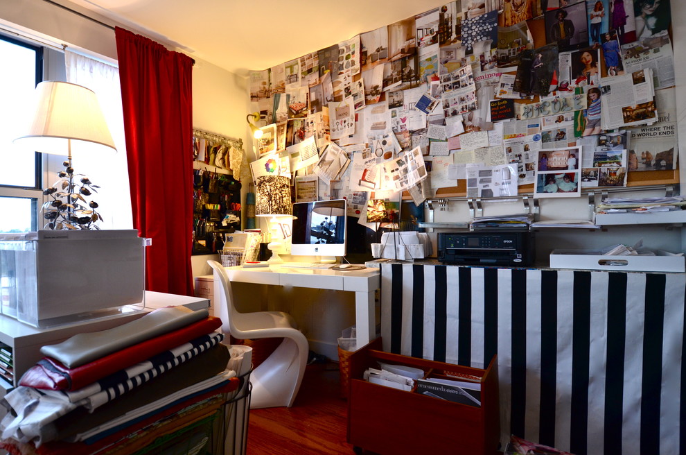 Inspiration for an eclectic home office in DC Metro with a freestanding desk.