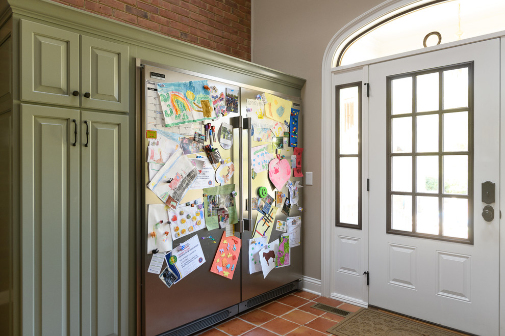 Inspiration for a mid-sized transitional terra-cotta tile and red floor front door remodel with beige walls and a dark wood front door