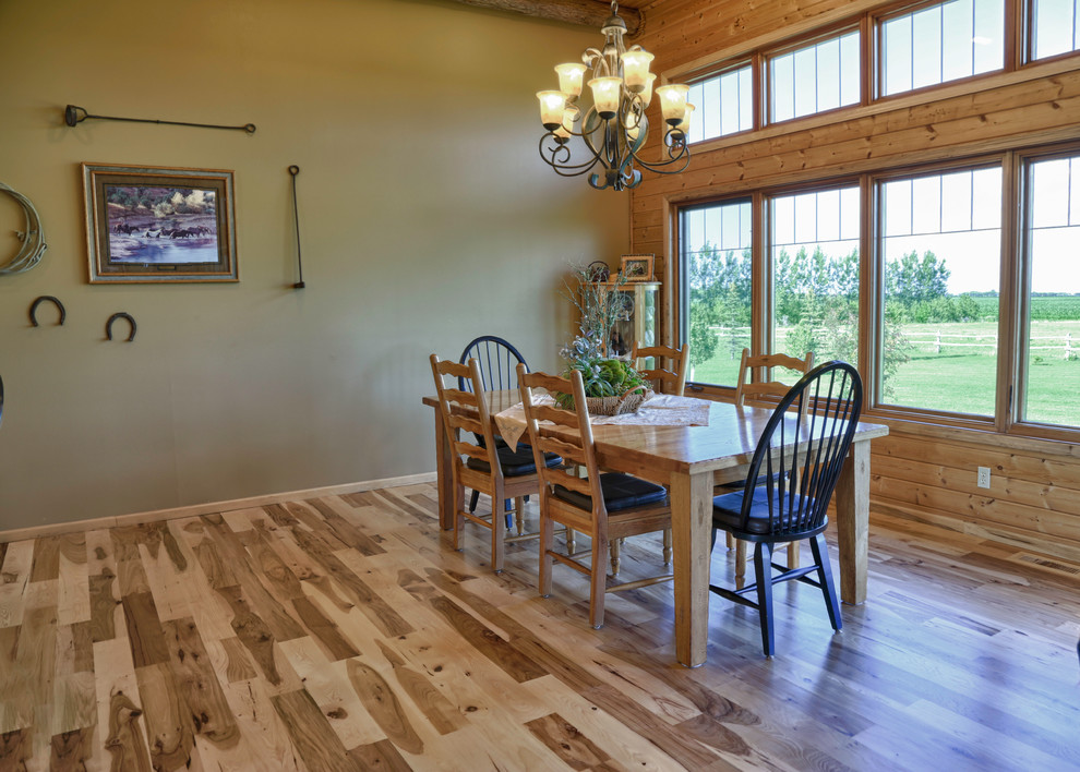 Mid-sized mountain style light wood floor kitchen/dining room combo photo
