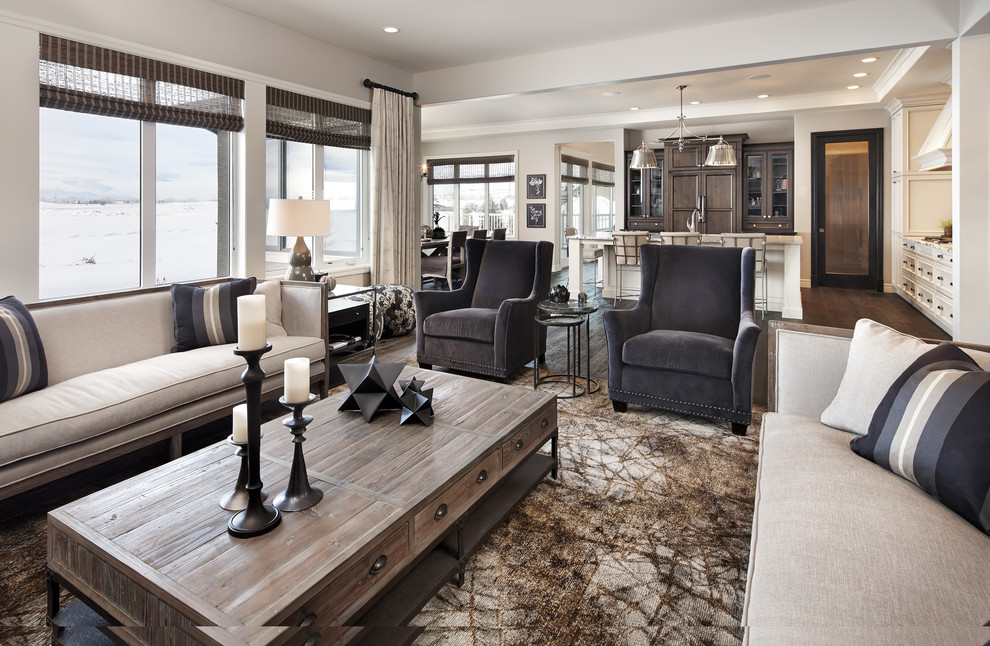 Inspiration for a transitional formal open concept living room in Calgary with beige walls, dark hardwood floors, a standard fireplace, a stone fireplace surround and a built-in media wall.