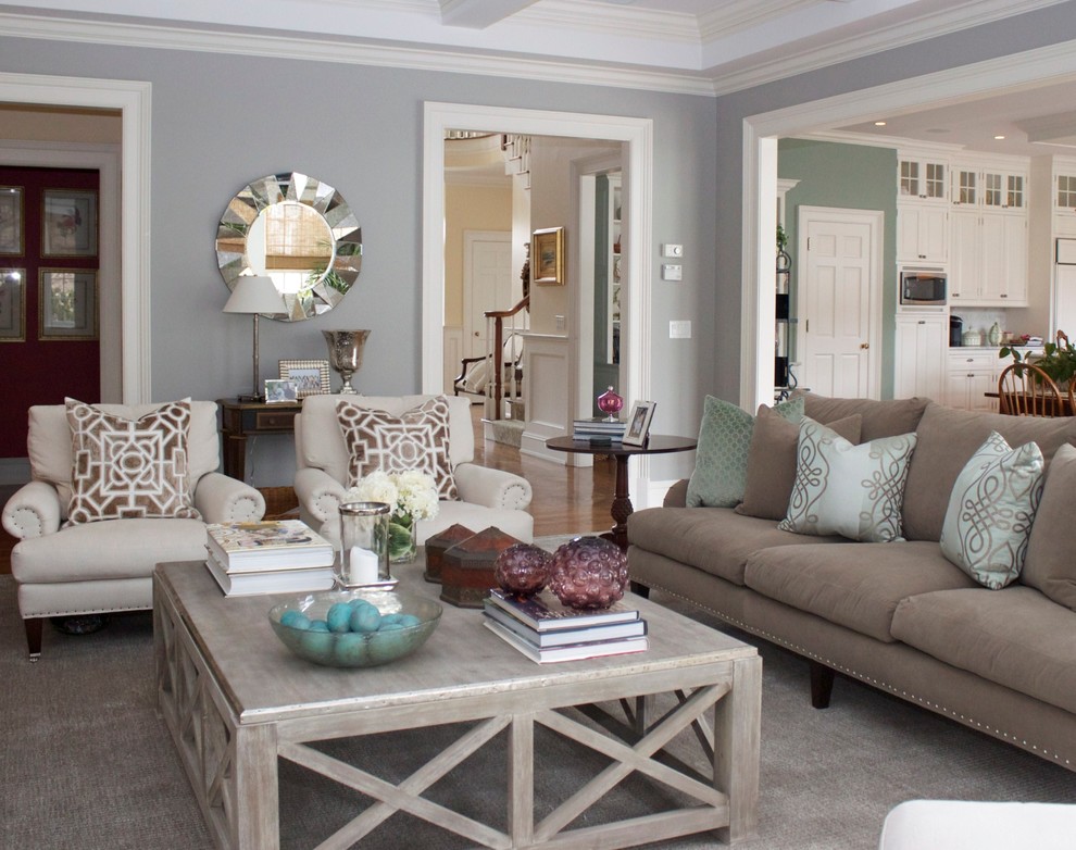 Design ideas for a transitional family room in New York with grey walls.