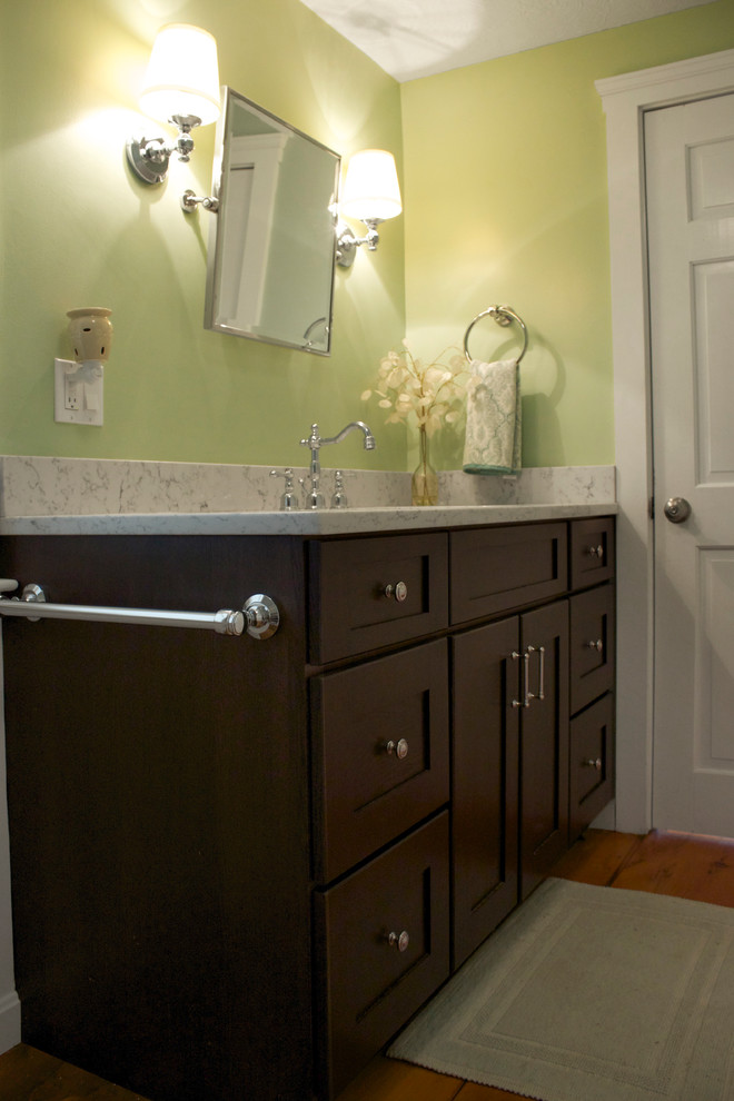 Example of a mid-sized transitional medium tone wood floor bathroom design in Boston with an undermount sink, shaker cabinets, dark wood cabinets, quartz countertops, a two-piece toilet and green walls