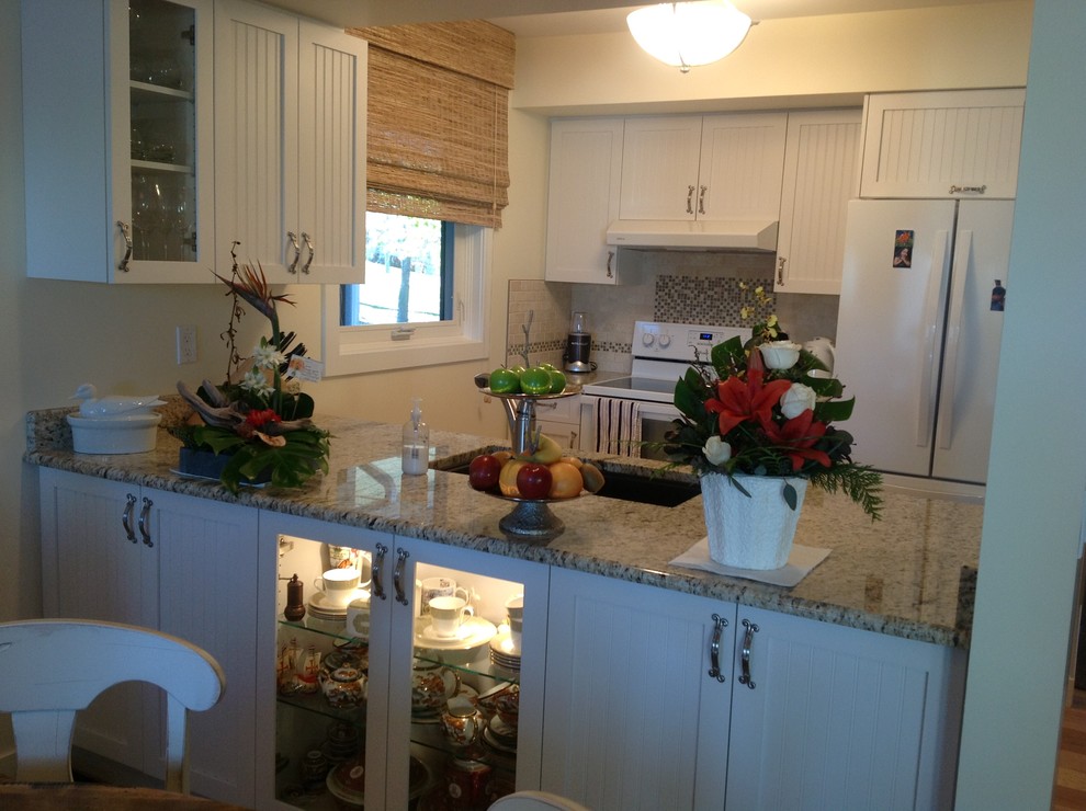Photo of a beach style kitchen in Calgary.