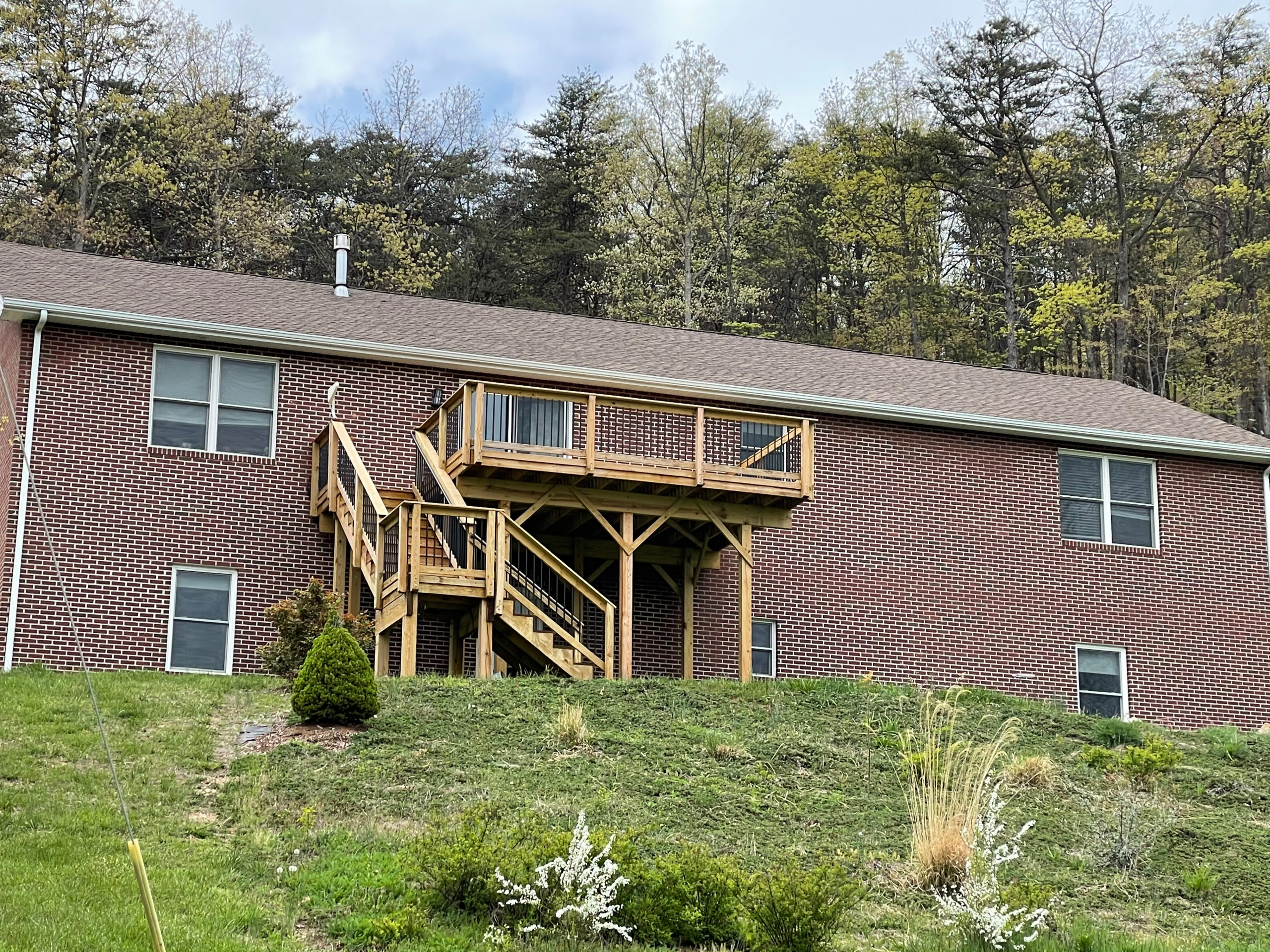 Deck stain and gutters powerwash