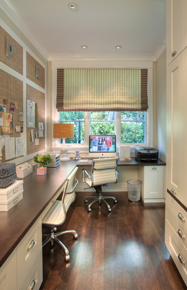 Design ideas for a transitional home office in San Francisco with a built-in desk.