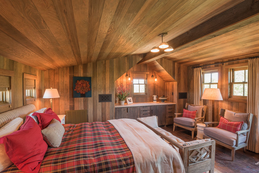 Inspiration for a country bedroom in Austin with dark hardwood floors.