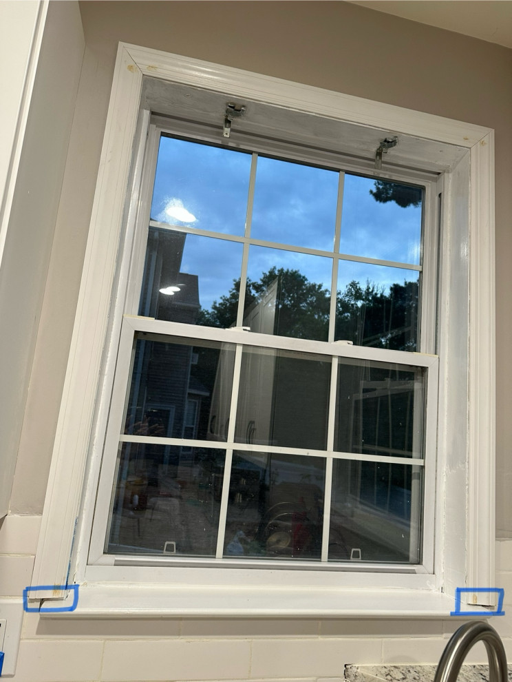 Gap between window frame and base/tile edge